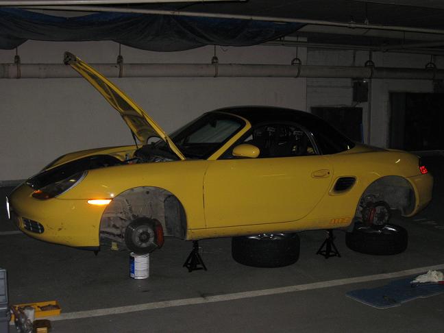 On jack stands with paint cans propping up the suspension